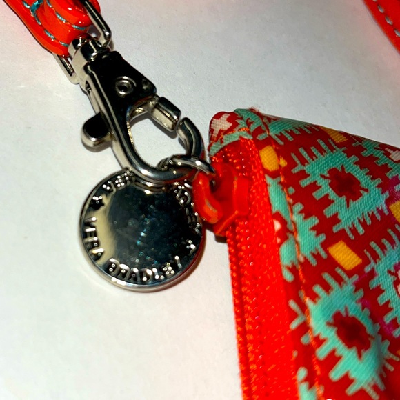 Vera Bradley bowtie crossbody. Orange,teal vinyl. Zips each end. 8.5x5” EUC  tag - Picture 4 of 9